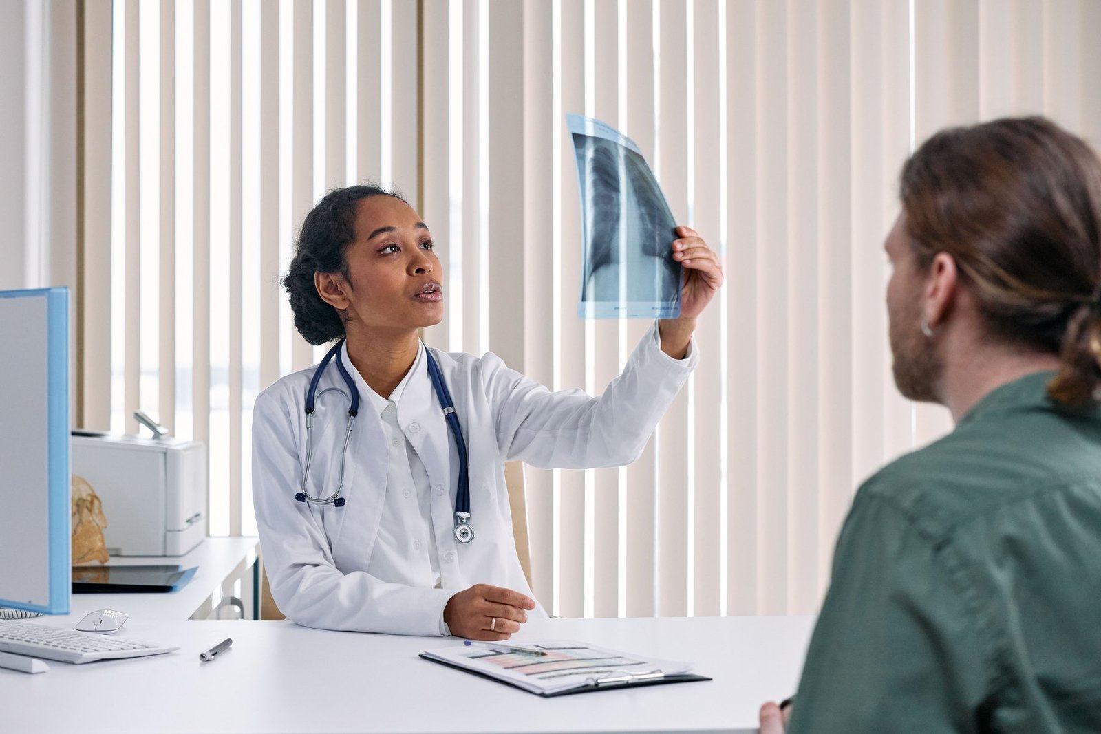 Two clinicians reviewing a scan together
