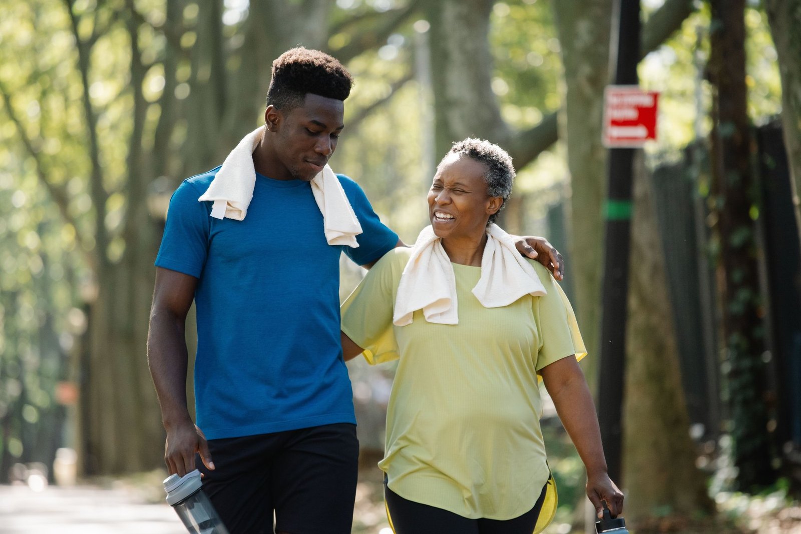 An older man walking outdoors for exercise