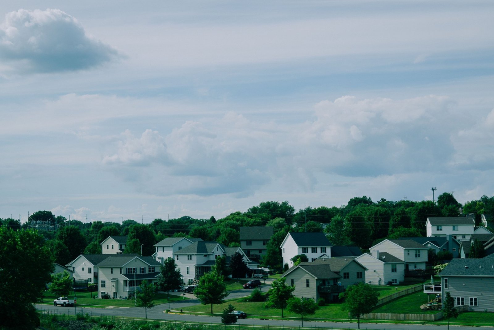 A quiet residential street of single-family homes